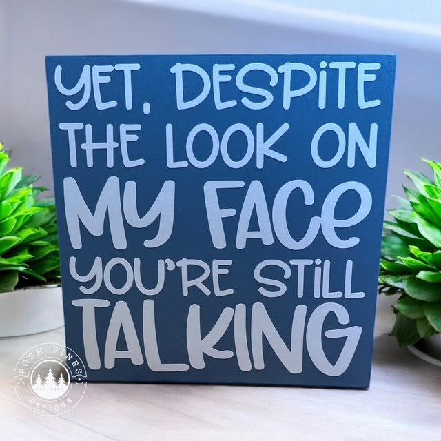 Despite the look on my face...